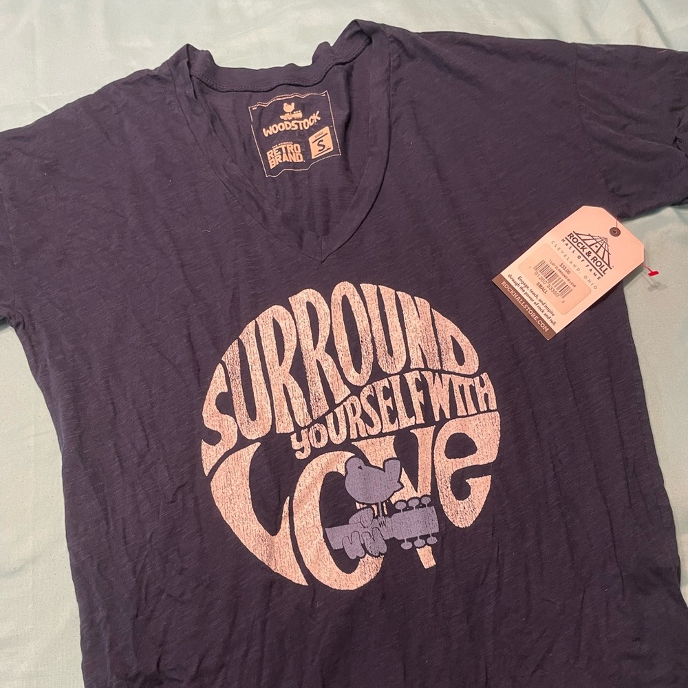 Brand new Woodstock Tee Shirt from the Rock and Roll Hall of Fame.